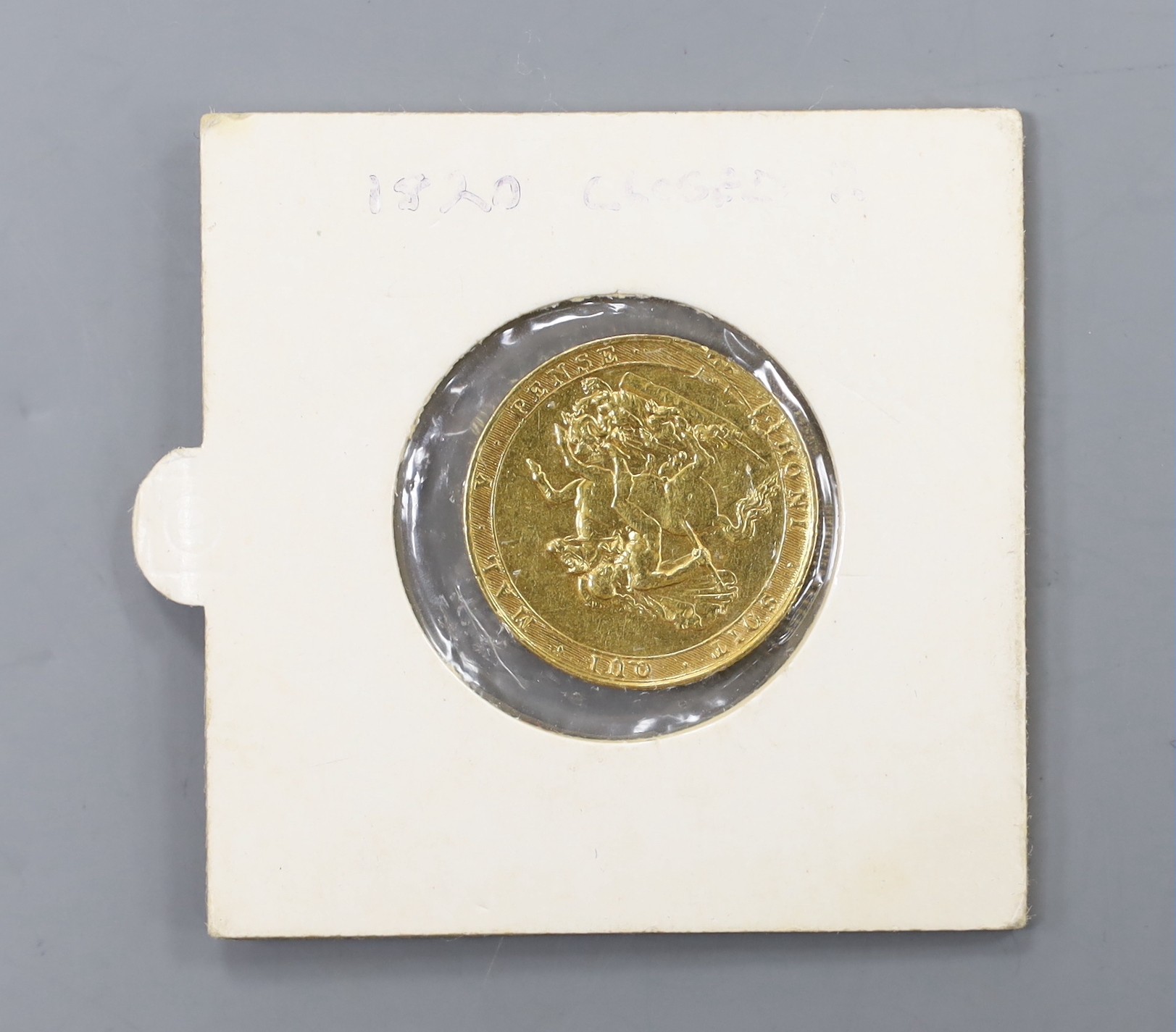 A George III gold sovereign 1820 (closed 2), VF or better (exmount).